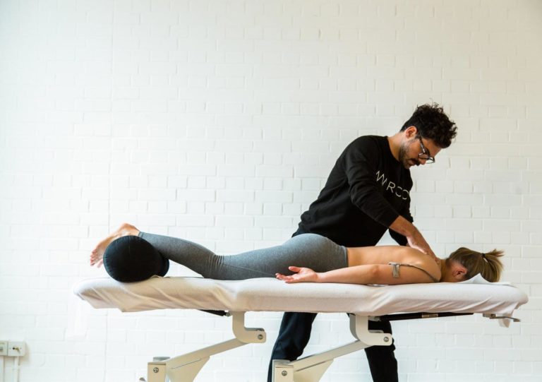 woman seeing an osteopath