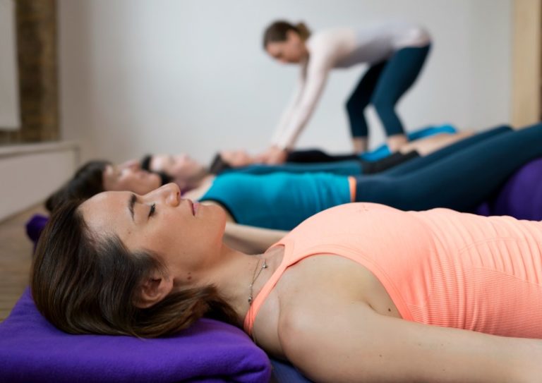 triyoga teacher Anna Ashby teaching restorative yoga
