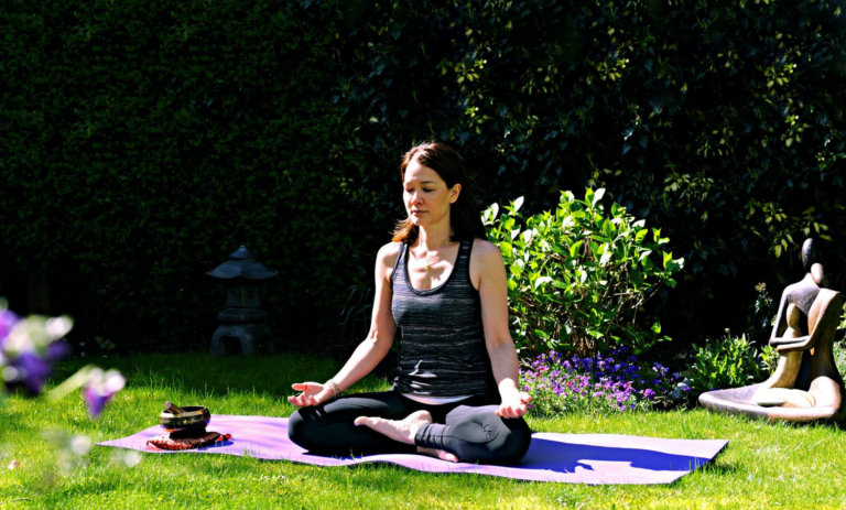 Sarah Lo meditation in garden - yin yoga during covid