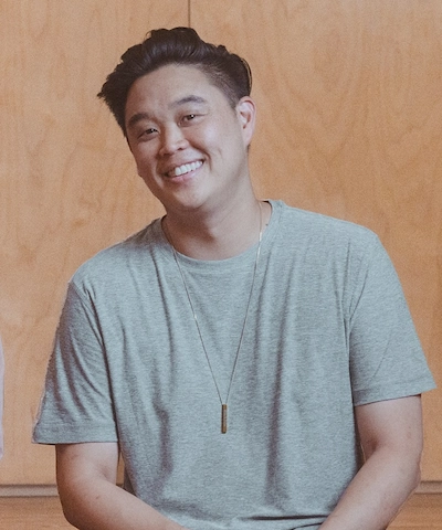 Smiling man in grey t-shirt
