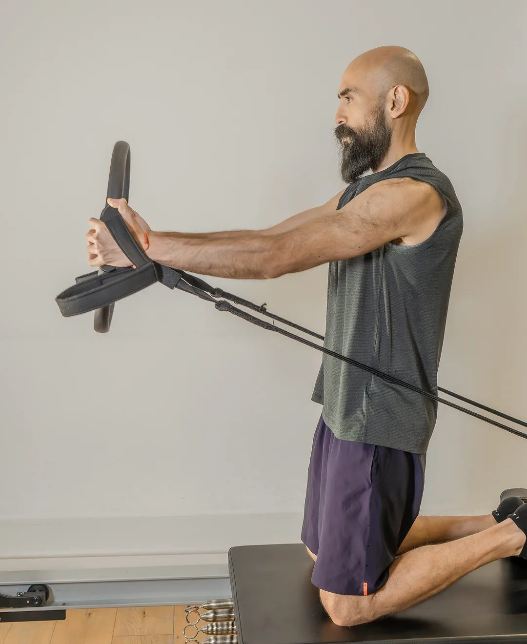 Man exercising with resistance bands