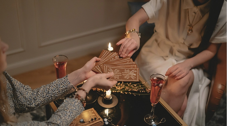 Tarot reading with drinks and candles