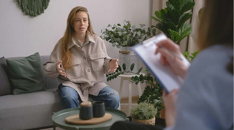 Woman speaking during a counselling session.