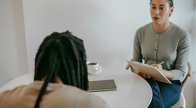 Two people engaged in conversation.