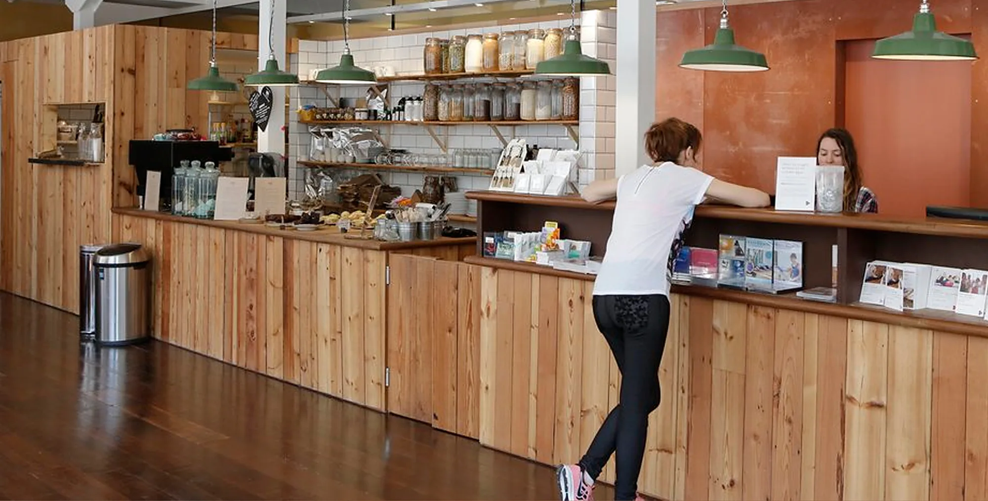 Wooden counter in a café setting.